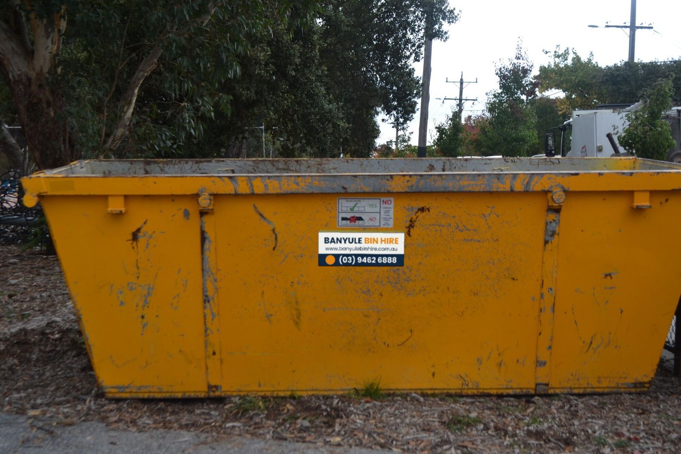 Banyule Bin Hire walk-in skip on a leafy bush block
